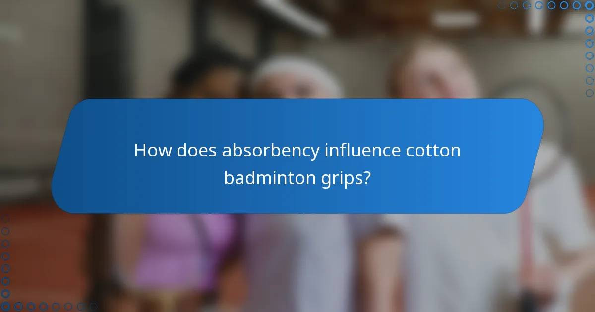 How does absorbency influence cotton badminton grips?
